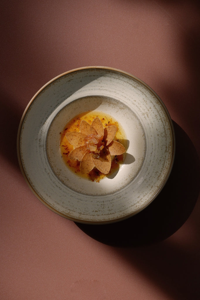 Saint-Jacques, a savory panna cotta dessert at Spice Canvas